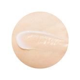 Texture shot of Glycolic Acid cream on hand